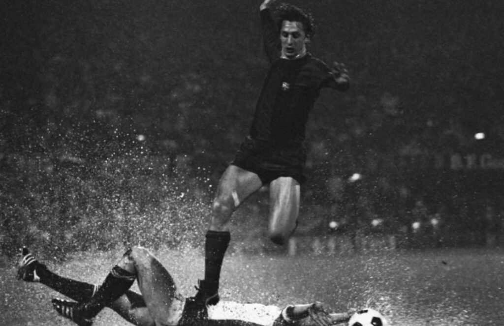Johan Cruyff on the water of De Kuip, in a very tough Feyenoord-Barcelona of the 1974 European Cup. - FC Barcelona History in the Europa League Barcelona will commence their 13th Europa League Season in the game against Manchester United at Camp Nou on February 16th. Today we will take a look back at Barcelonas past record in UEFA Europa League. #EuropaLeague #UEL #ManUtdBarcelona #UEFA #BarcaManUtd #ManchesterUnited   #raphinha #barca #fcblive #fcbarcelona #alba #pedri #gavi #barcanews #LaLiga #CopaDelRey #frenkiedejong #lewandowski #xavi #terstergen #alba